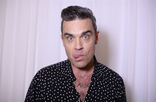 Kijk maar snel: naaktfoto Robbie Williams!