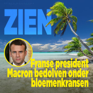 ZIEN: Franse president Macron bedolven onder bloemenkransen