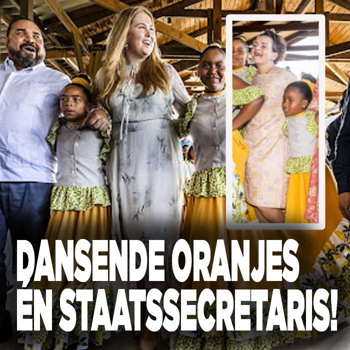 Dansende Oranjes en staatssecretaris Van Huffelen.|