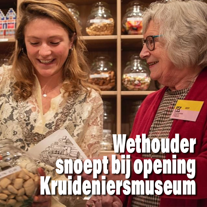 Snoepende wethouder bij nieuw Kruideniersmuseum.|Utrechtse wethouder Eva Oosters opent Kruideniersmudeum.||